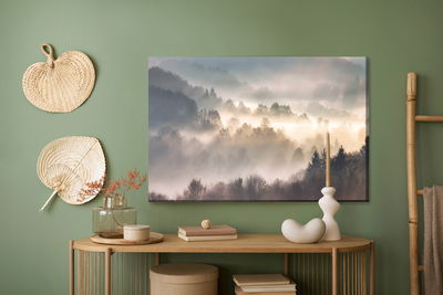 Ljuddämpande tavla - Mist in forest with sunbeam