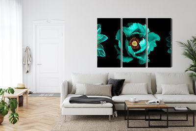 Ljuddämpande tavla - Turquoise flowers on a black