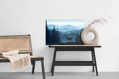 Ljuddämpande tavla - Silhouette of a deer against