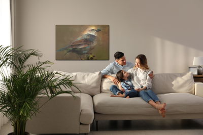 Ljuddämpande tavla - Bird sitting on a branch