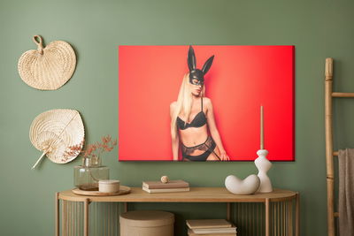 Ljuddämpande tavla - Woman in bunny costume