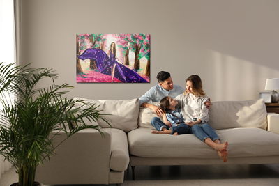 Ljuddämpande tavla - A woman among spring flowers