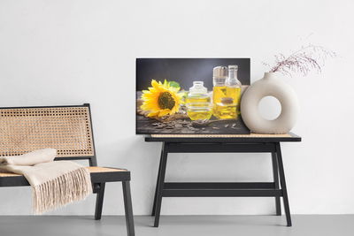 Ljuddämpande tavla - Bottles with sunflower oil