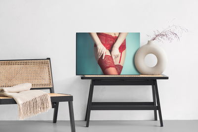 Ljuddämpande tavla - Woman in red underwear