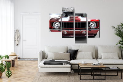 Ljuddämpande tavla - A red muscle car in a garage