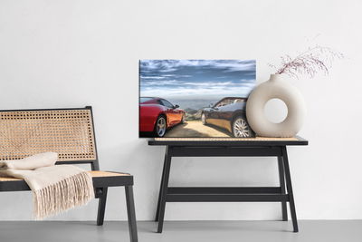 Ljuddämpande tavla - Luxurious cars in front