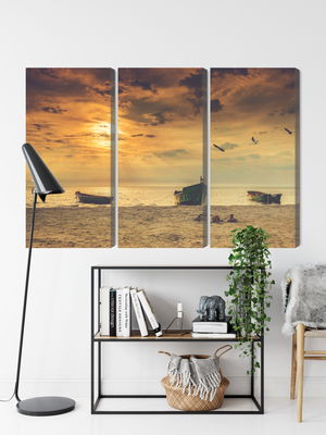 Ljuddämpande tavla - Boats on the beach at sunset