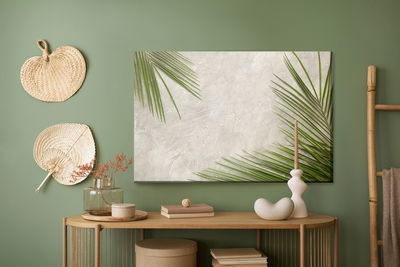 Ljuddämpande tavla - Palm leaves on a concrete