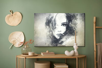 Ljuddämpande tavla - A female face