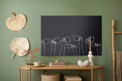 Ljuddämpande tavla - Hands holding cups