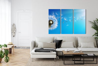 Ljuddämpande tavla - Dandelion with flying seeds