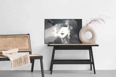 Ljuddämpande tavla - Woman's face in an abstract