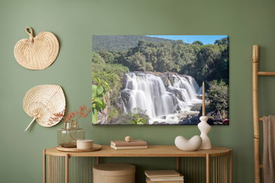 Ljuddämpande tavla - A waterfall among lush
