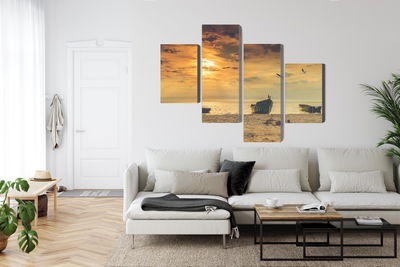 Ljuddämpande tavla - Boats on the beach at sunset