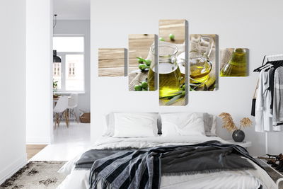Ljuddämpande tavla - Olive oil with green olives