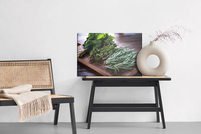 Ljuddämpande tavla - Bundles of herbs on a wooden