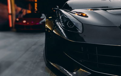 Ljuddämpande tavla - Front of a black sports car