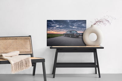 Ljuddämpande tavla - Sunset car and clouds
