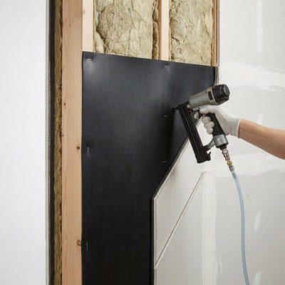 SilentDirect MLV is mounted on a wall with wooden studs to block airborne sound