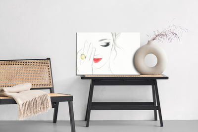 Ljuddämpande tavla - A delicate female face