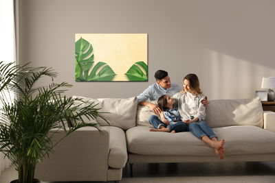 Ljuddämpande tavla - Monstera leaves on a beige