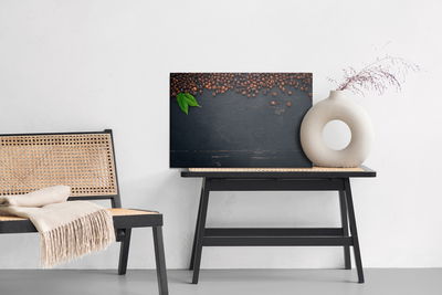 Ljuddämpande tavla - Coffee on a wooden background