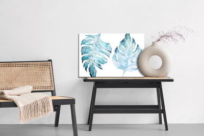 Ljuddämpande tavla - Blue monstera leaves painted