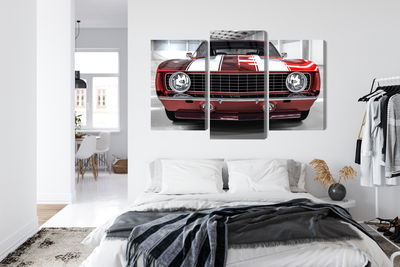 Ljuddämpande tavla - A red muscle car in a garage