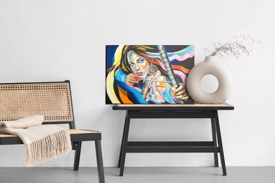 Ljuddämpande tavla - Woman with a bow