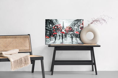 Ljuddämpande tavla - People with red umbrellas