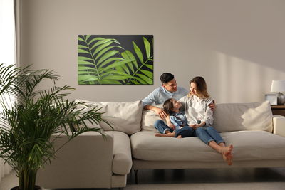 Ljuddämpande tavla - Green tropical leaves