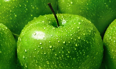 Ljuddämpande tavla - Green apples on a macro scale