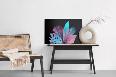 Ljuddämpande tavla - Neon tropical leaves