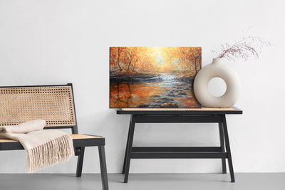 Ljuddämpande tavla - River in the autumn forest