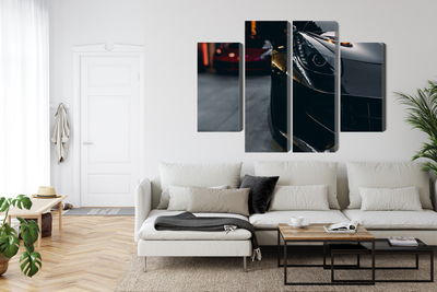 Ljuddämpande tavla - Front of a black sports car