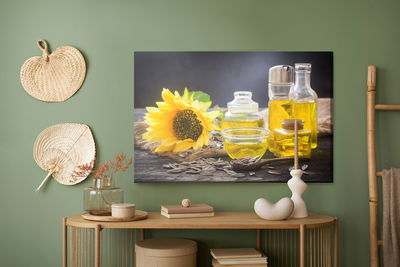 Ljuddämpande tavla - Bottles with sunflower oil