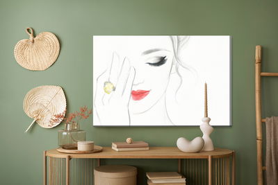 Ljuddämpande tavla - A delicate female face