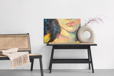 Ljuddämpande tavla - A female face in an abstract