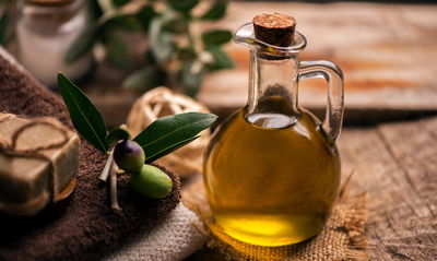 Ljuddämpande tavla - A bottle of olive oil