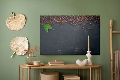 Ljuddämpande tavla - Coffee on a wooden background