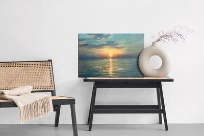 Ljuddämpande tavla - Picturesque sunset by the sea