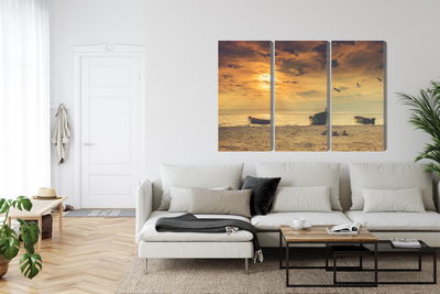 Ljuddämpande tavla - Boats on the beach at sunset