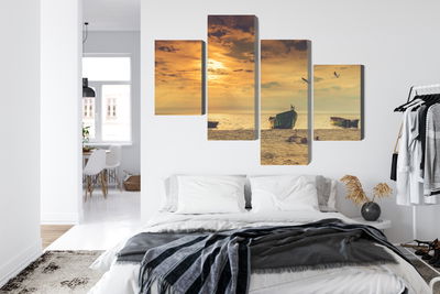 Ljuddämpande tavla - Boats on the beach at sunset