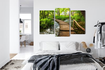 Ljuddämpande tavla - Wooden bridge in a forest