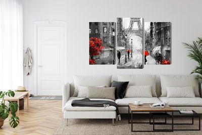 Ljuddämpande tavla - People with red umbrellas