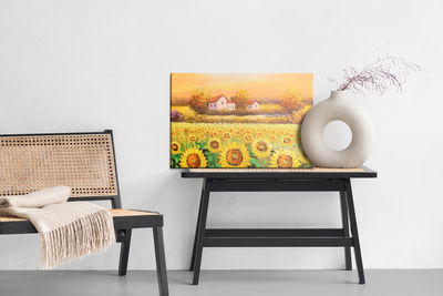 Ljuddämpande tavla - Cottages at a sunflower field