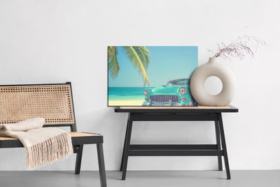 Ljuddämpande tavla - Retro car on a tropical beach