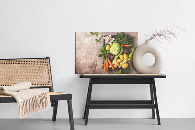 Ljuddämpande tavla - Vegetables on concrete