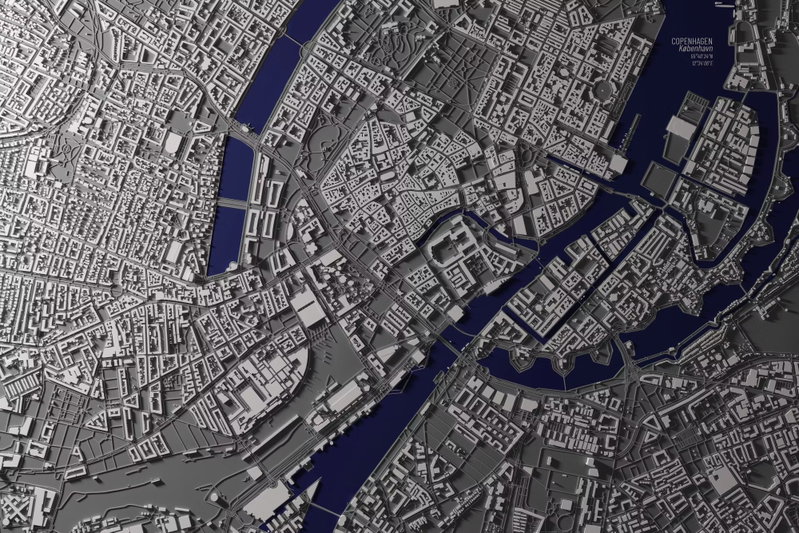 Copenhagen center: Täta grå gatulinjer och ljusa kvarter möter mörkblå vattenstråk i en detaljerad bild av Köpenhamns centrum.