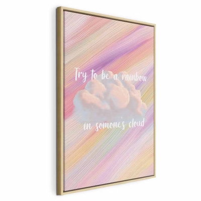 Try to be a rainbow vertical – naturfärgad ram. Diagonala regnbågsstråk i pastell möter vita moln och ett engelskt citat.